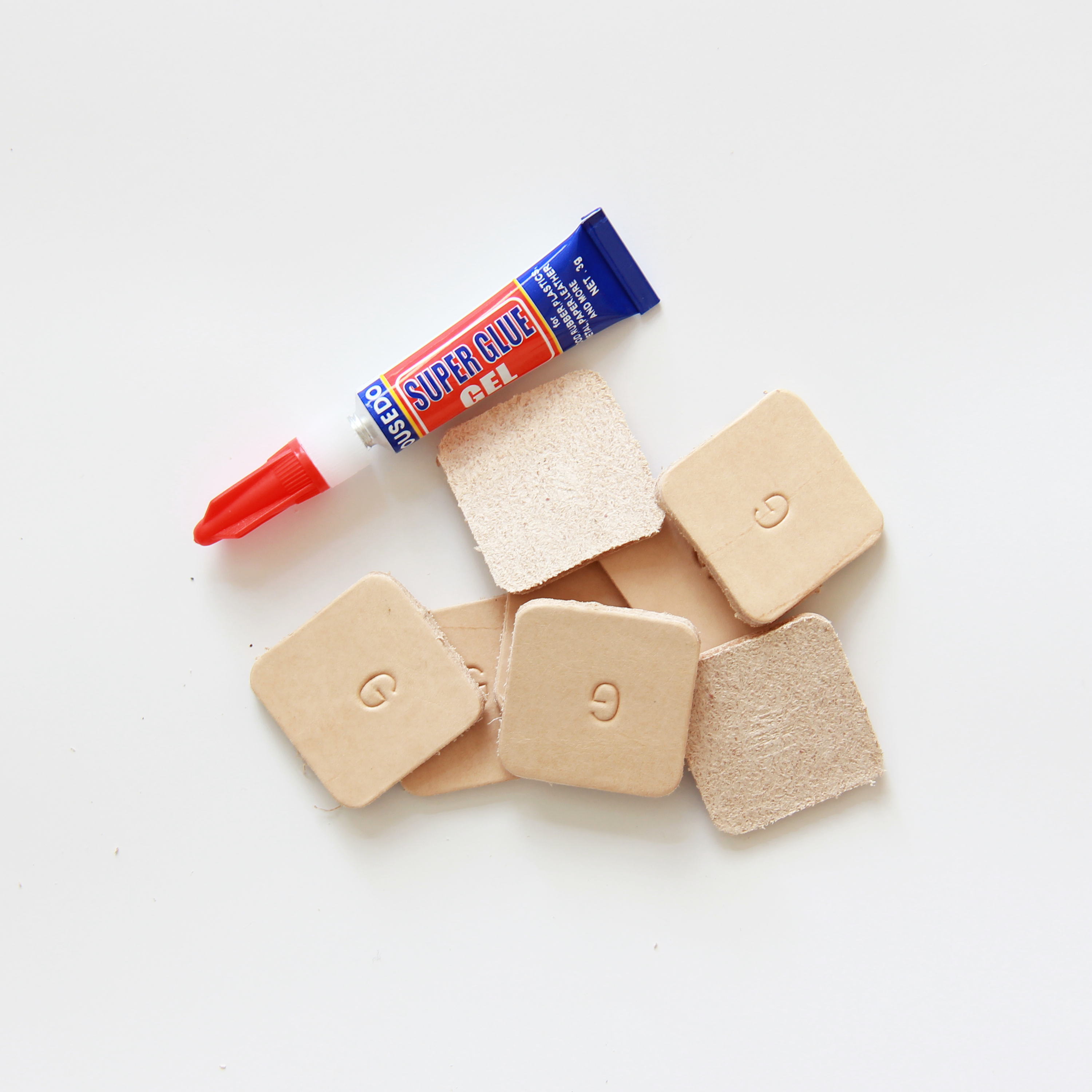 Glue-On Leather Floor Protectors for Modern Furniture - 1.25" Square USA-Made Vegetable Tanned Pads (8-Pack)